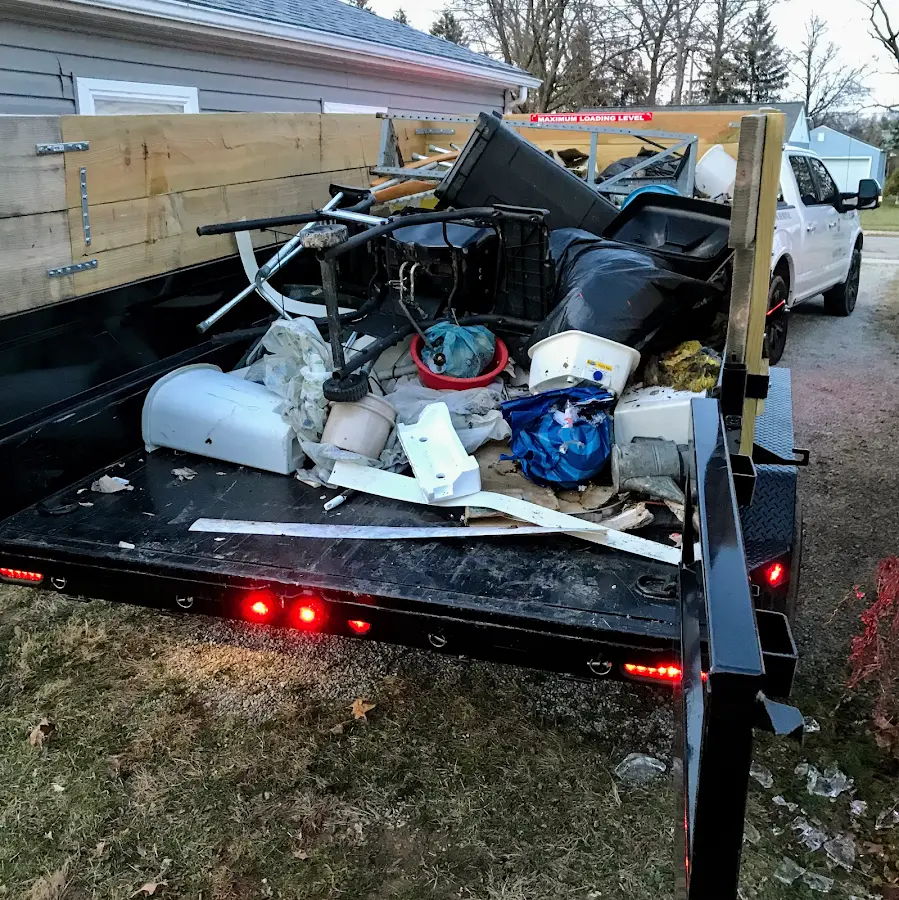 Roll-off dumpster delivered to a residential driveway in Essex