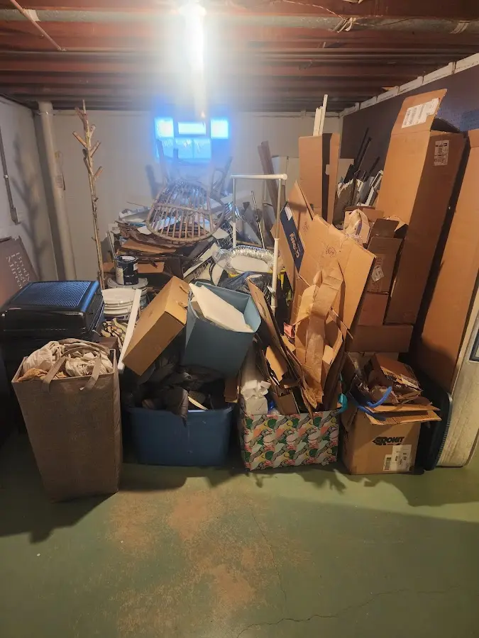 Roll-off dumpster container at job site for 6 Yard Dumpster Rental in Essex